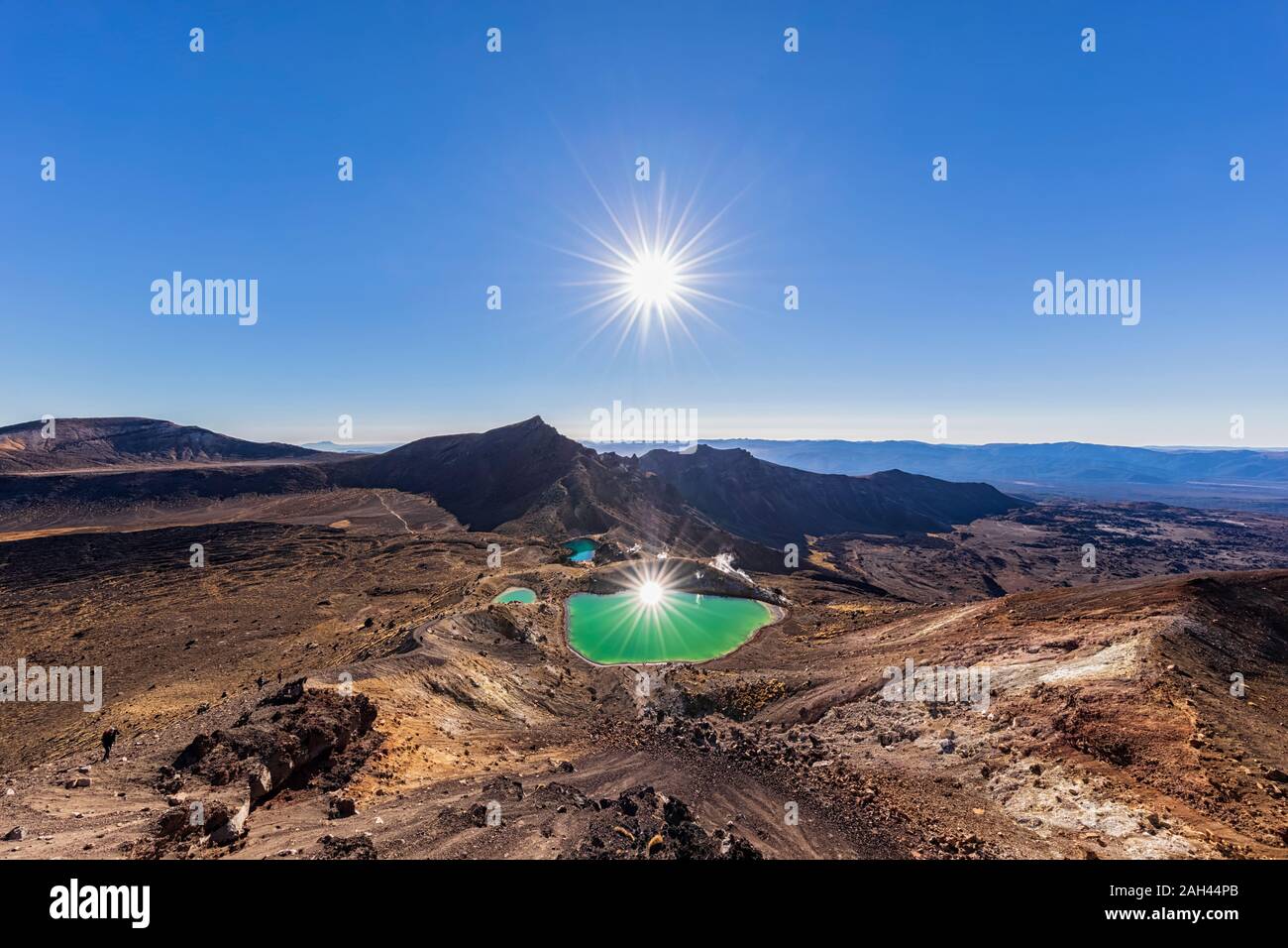 New Zealand, North Island, Sun shining over Emerald Lakes in North Island Volcanic Plateau Stock Photo