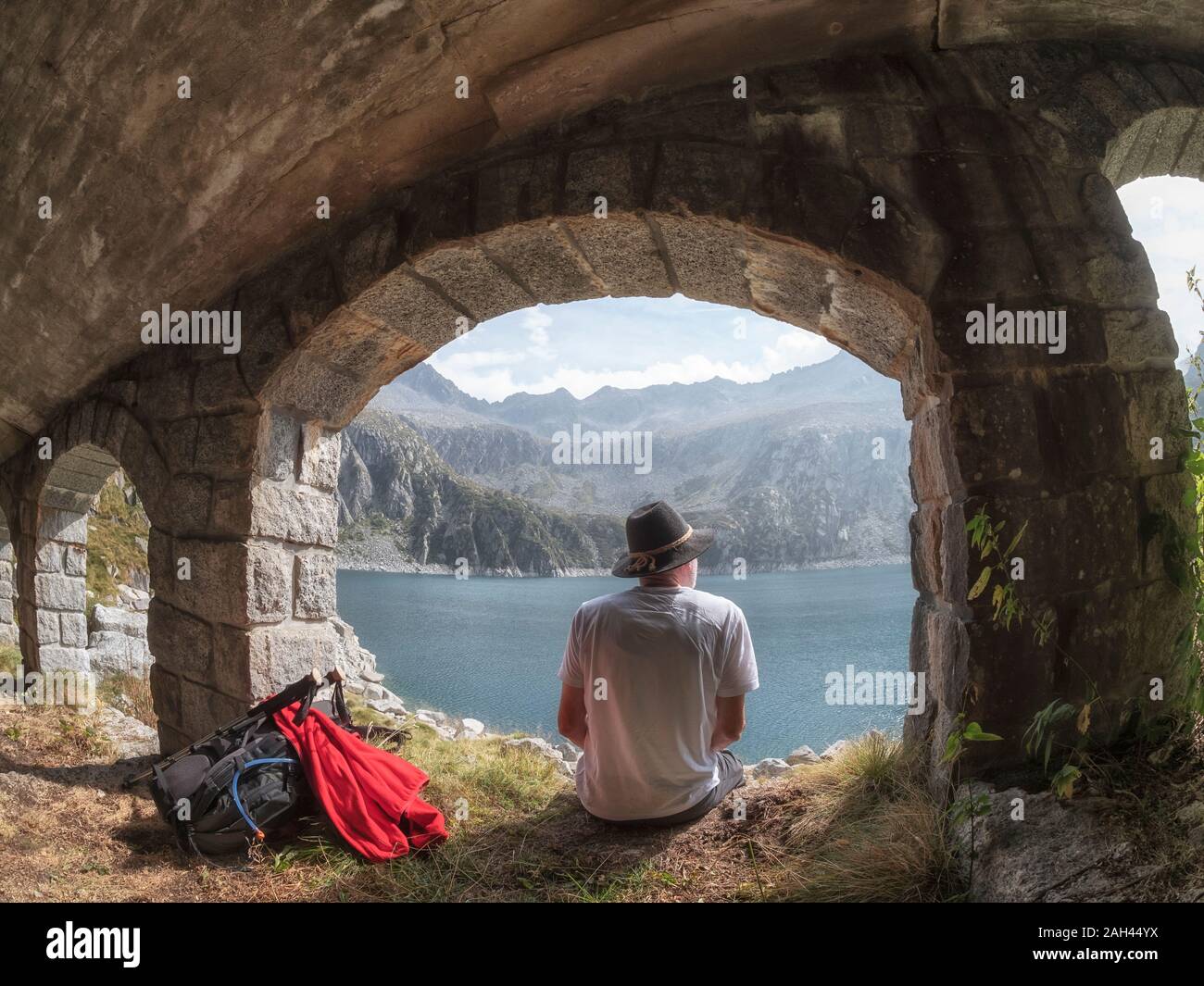 Man sitting under bridge hi-res stock photography and images - Alamy