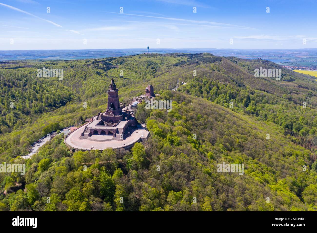 Germany, Thuringia, Aerial view of Kyffhaeuser Monument surrounded by green forest Stock Photo