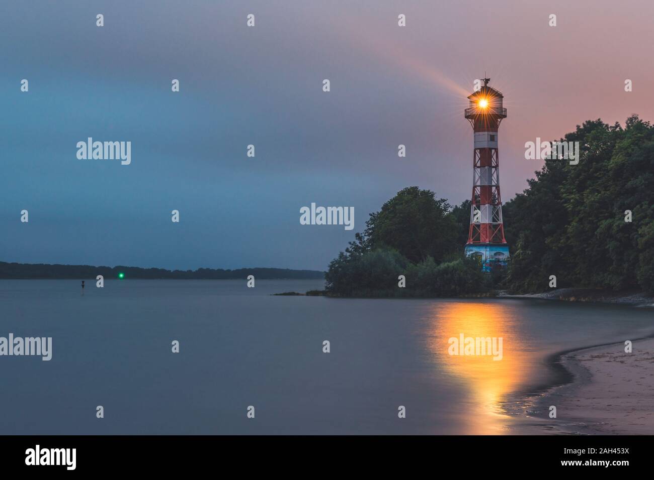 Germany, Hamburg, Rissen lighthouse at dusk Stock Photo