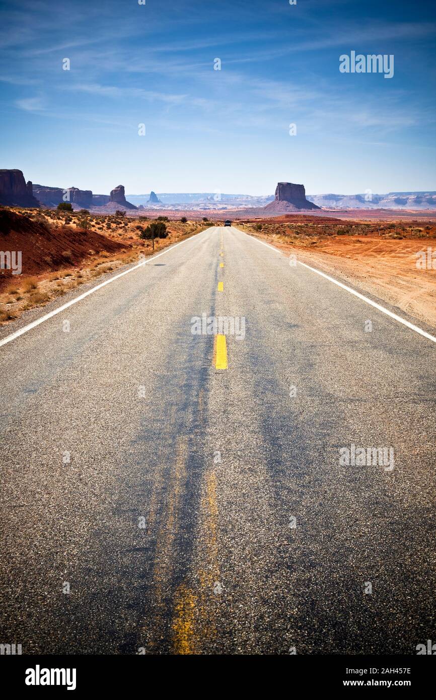 USA, Arizona, Empty highway across Monument Valley Stock Photo