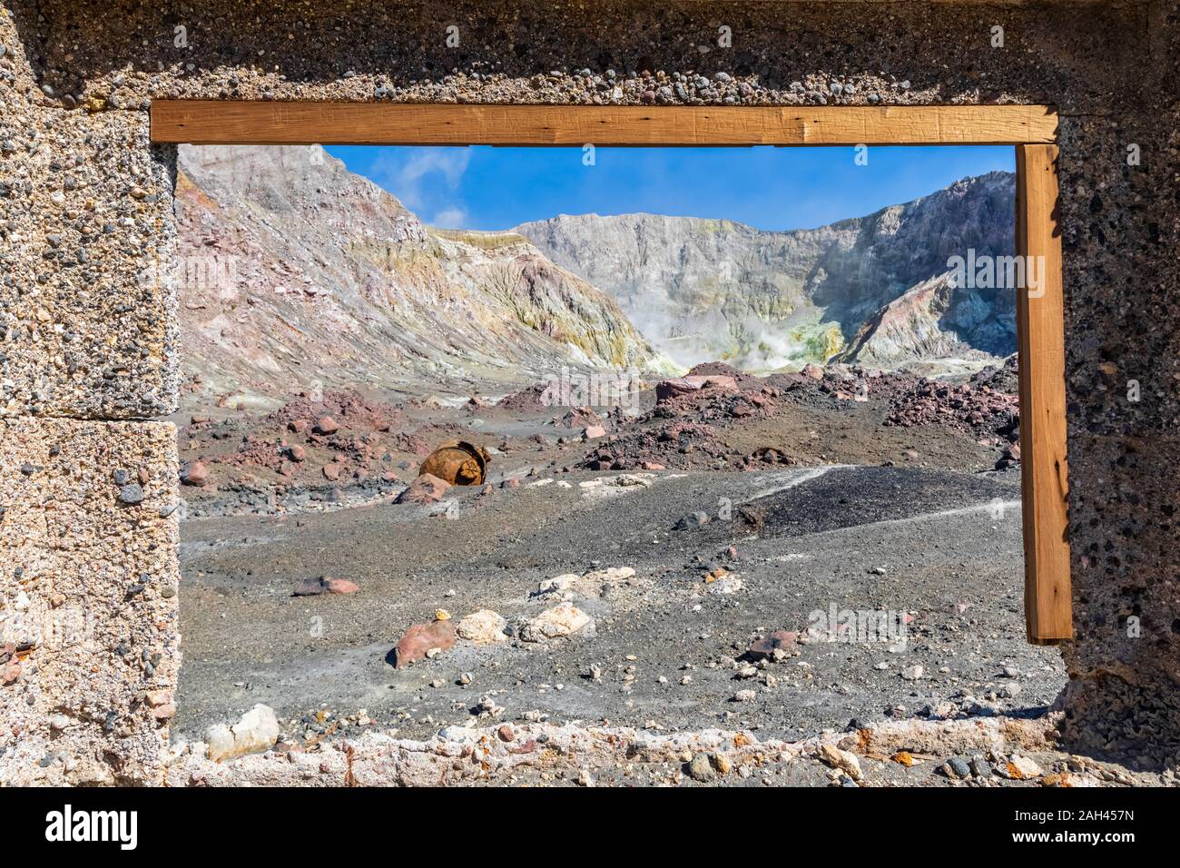 New Zealand, North Island, Whakatane, Window frame of ruined sulphur mine on White Island (Whakaari) Stock Photo