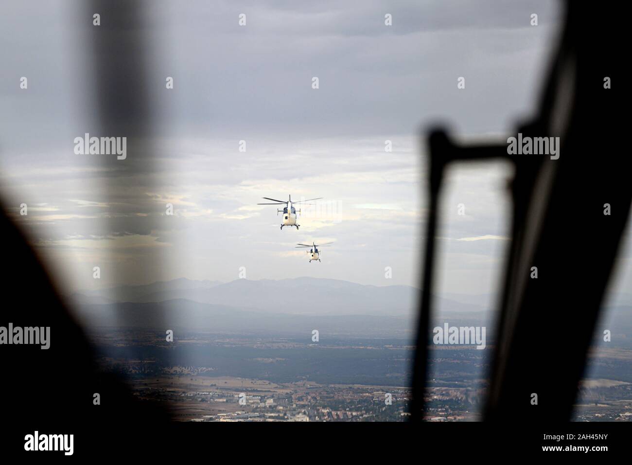 Spain, Madrid, Police helicopters flying above city Stock Photo