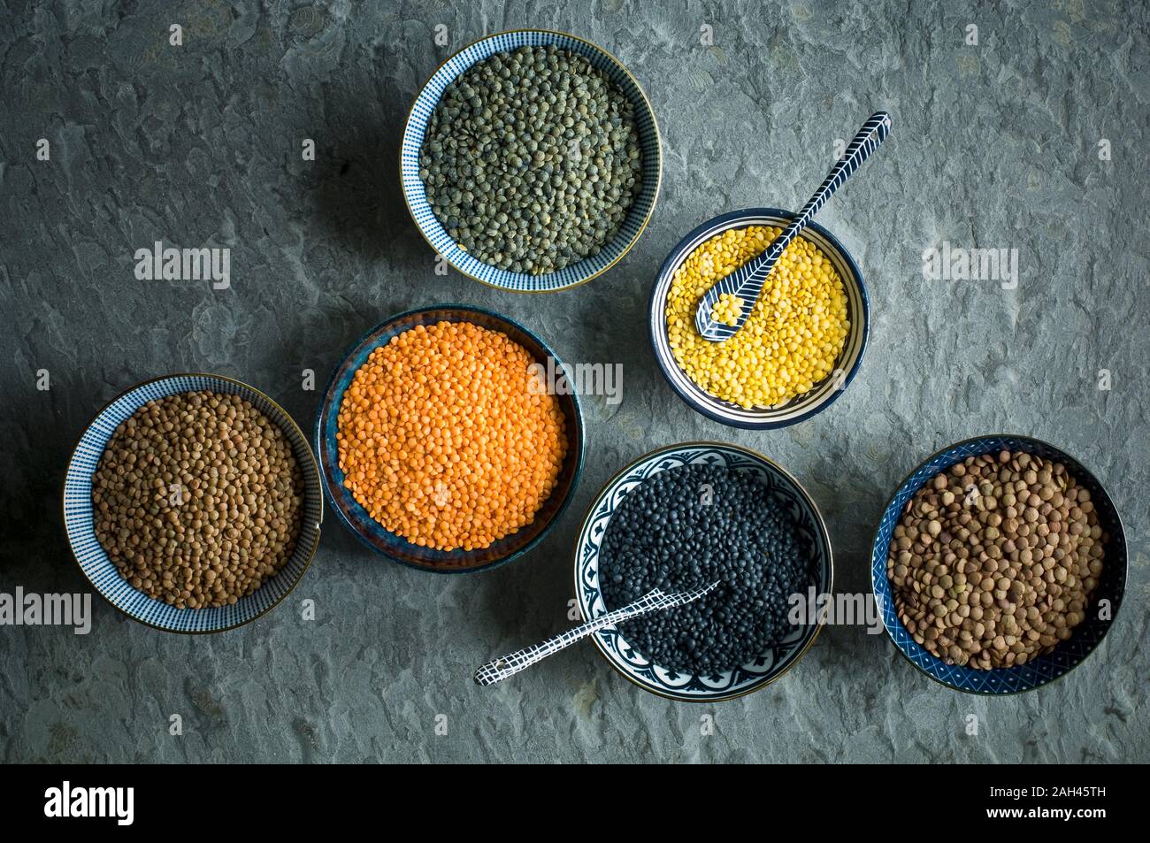 Bowls of colorful lentils Stock Photo