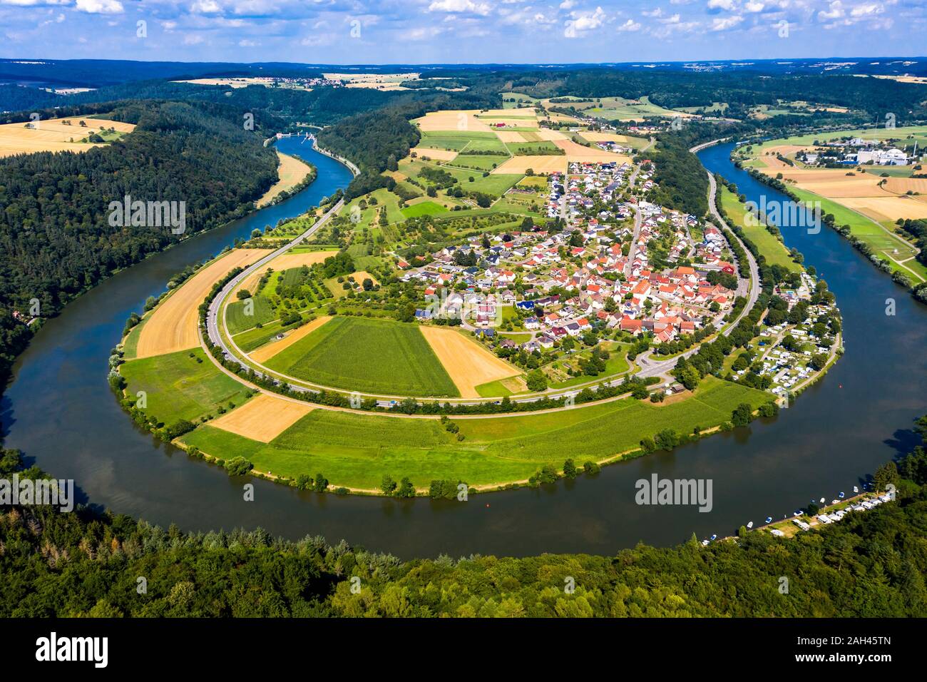 Germany, Bavaria, Binau, Aerial view of river curving around countryside town Stock Photo