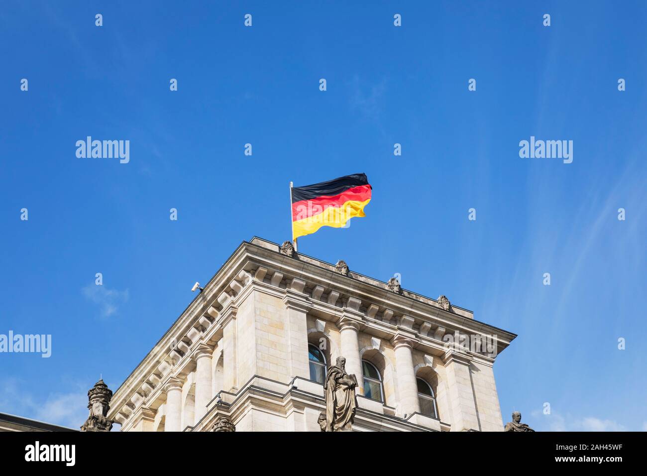 Germany, Berlin, German flag on top of Reichstag building Stock Photo