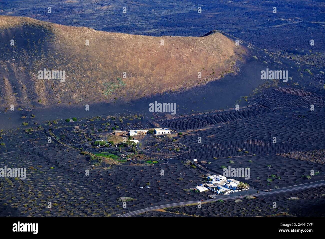 Spain, Canary Islands, Lanzarote, La Geria region, High angle view of Vineyards and hills Stock Photo