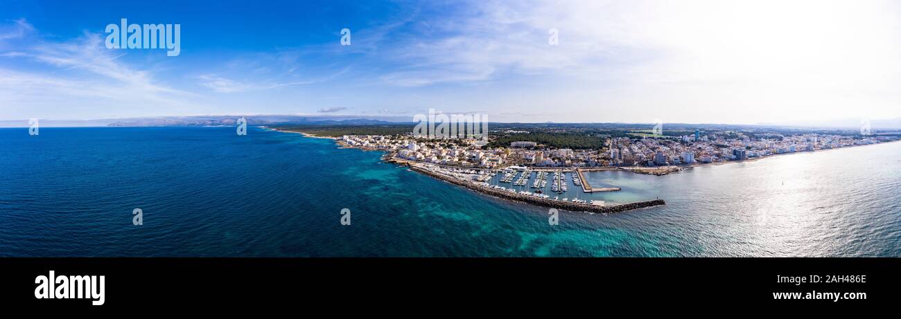 Spain, Mallorca, Aerial panorama of Can Picafort resort harbor in summer Stock Photo