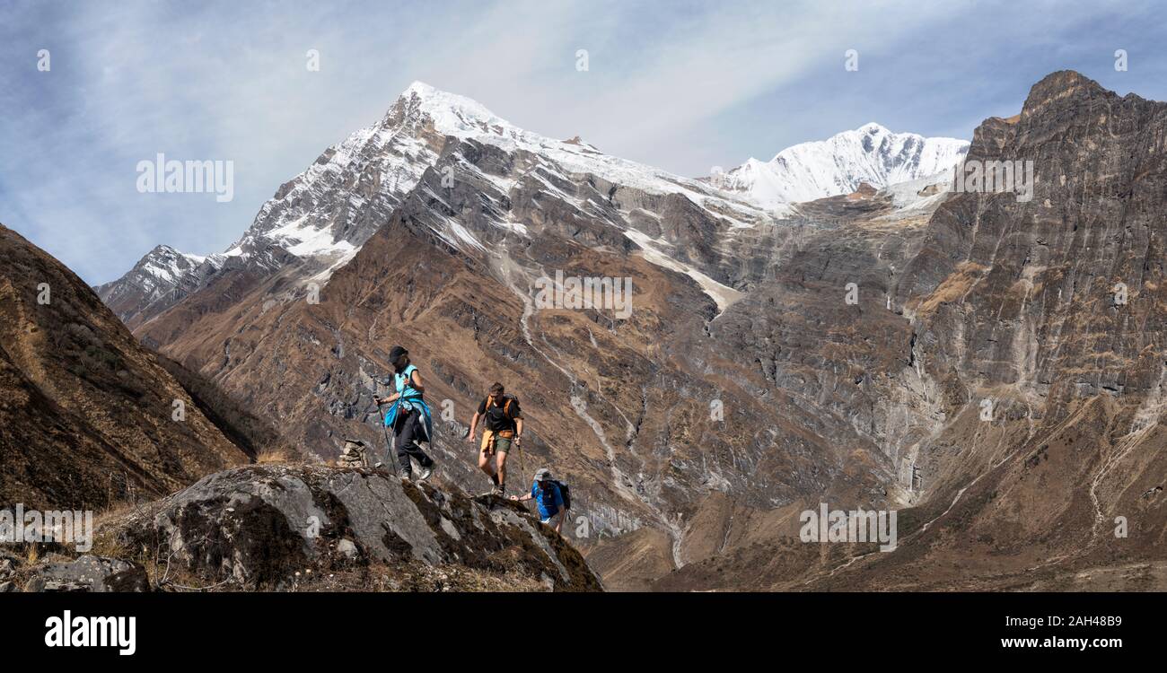 Hikers at Tsaurabong Peak, Italian Base Camp, Dhaulagiri Circuit Trek, Himalaya, Nepal Stock Photo