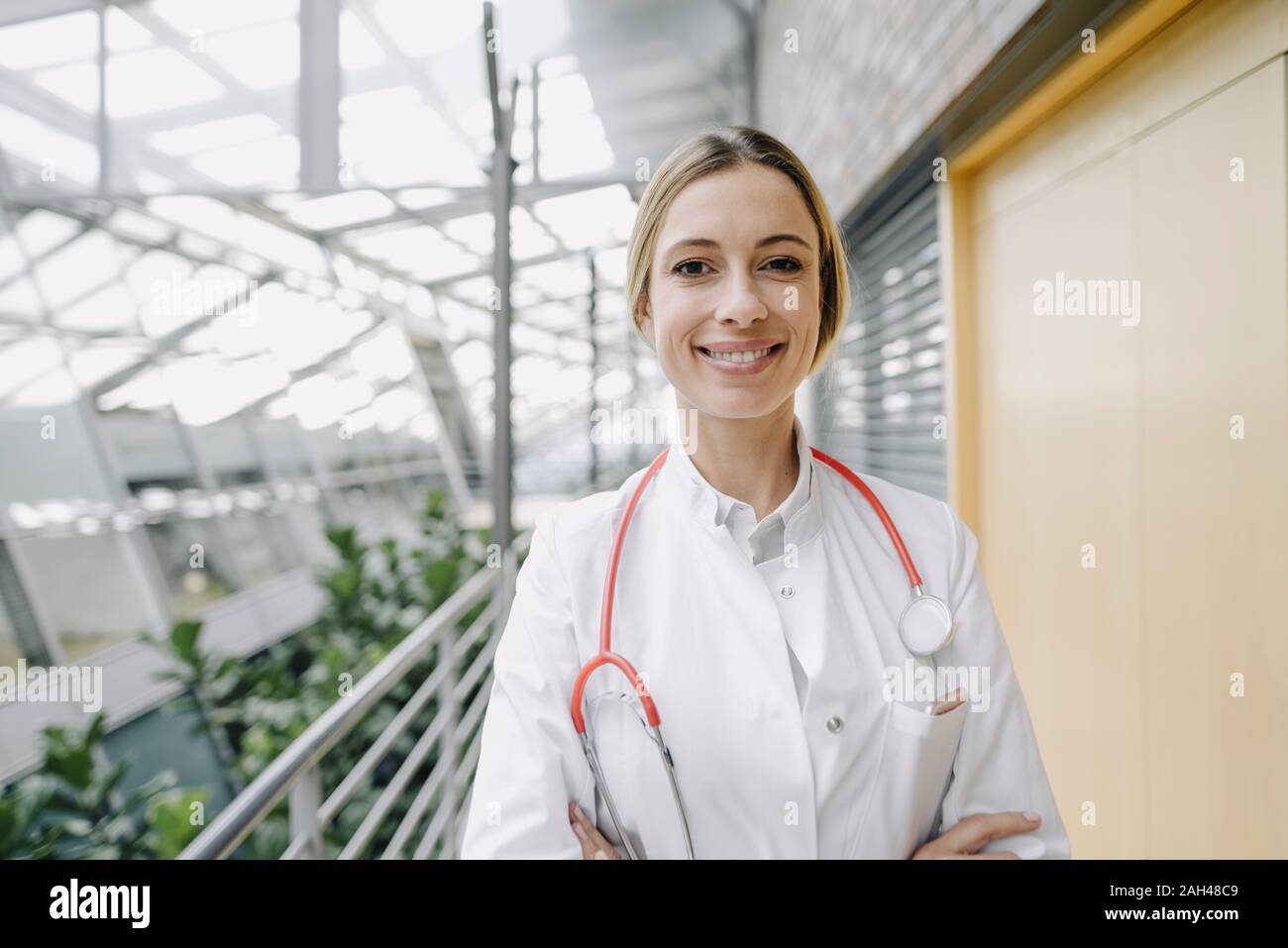 Portrait of a smiling female doctor Stock Photo