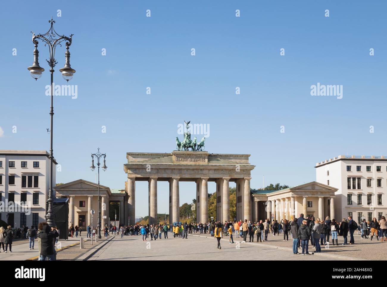 Germany, Berlin, Pedestrians in front of Brandenburg Gate Stock Photo