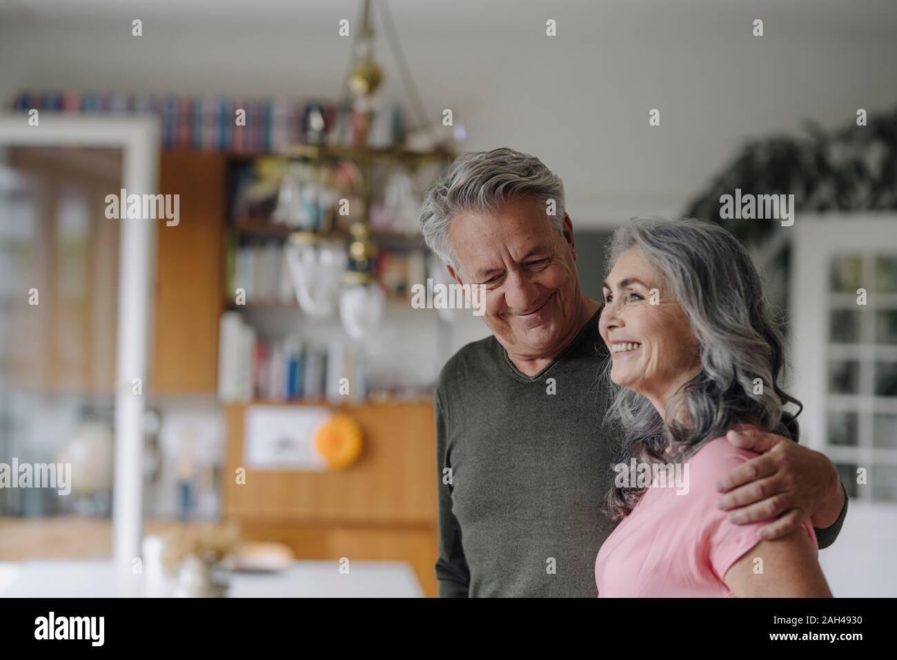 Portrait of a happy senior couple at home Stock Photo