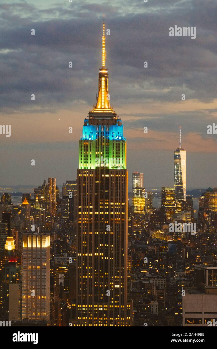 USA, New York, New York City, Empire State Building illuminated at dusk Stock Photo