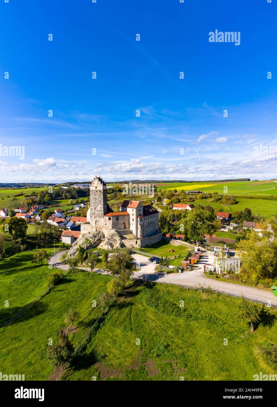 Germany, Baden-Wurttemberg, Dischingen, Katzenstein Castle and surrounding village houses Stock Photo
