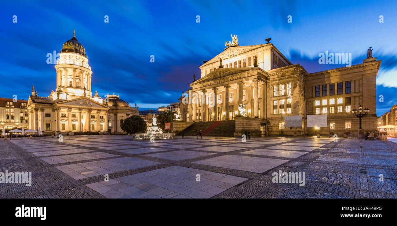 Germany, Berlin, Gendarmenmarkt, Mitte, German Cathedral and Konzerthaus illuminated at dusk Stock Photo