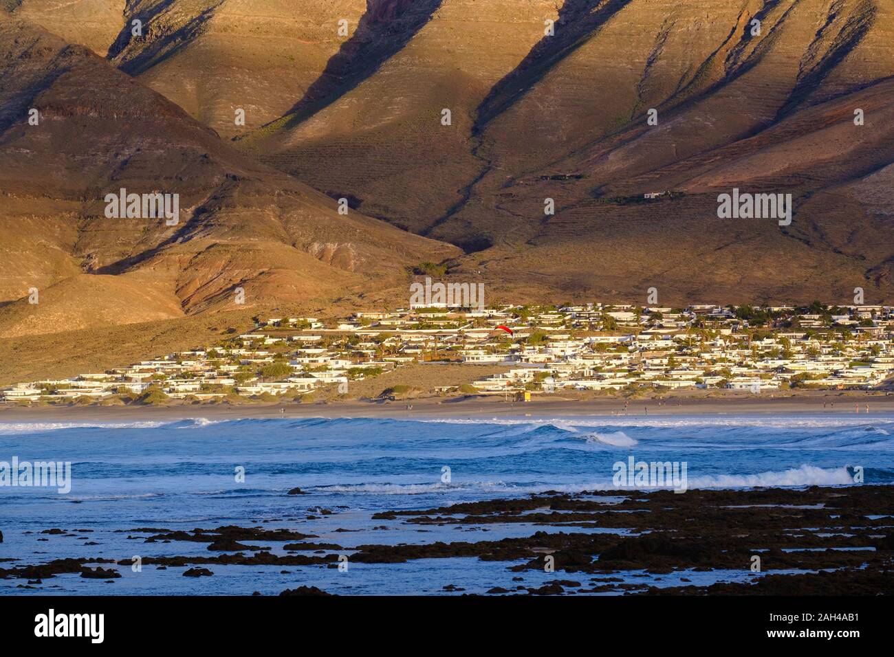 Spain, Canary Islands, Caleta de Famara, Bungalows of coastal village Stock Photo