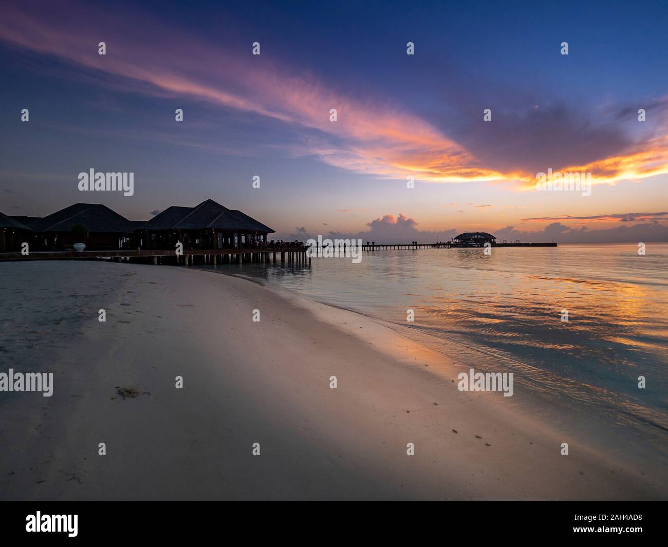 Maldives, Sandy coastal beach of South Male Atoll at dusk Stock Photo