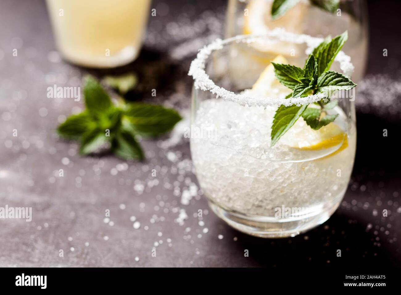 Margarita cocktails with lemon and mint leaves Stock Photo