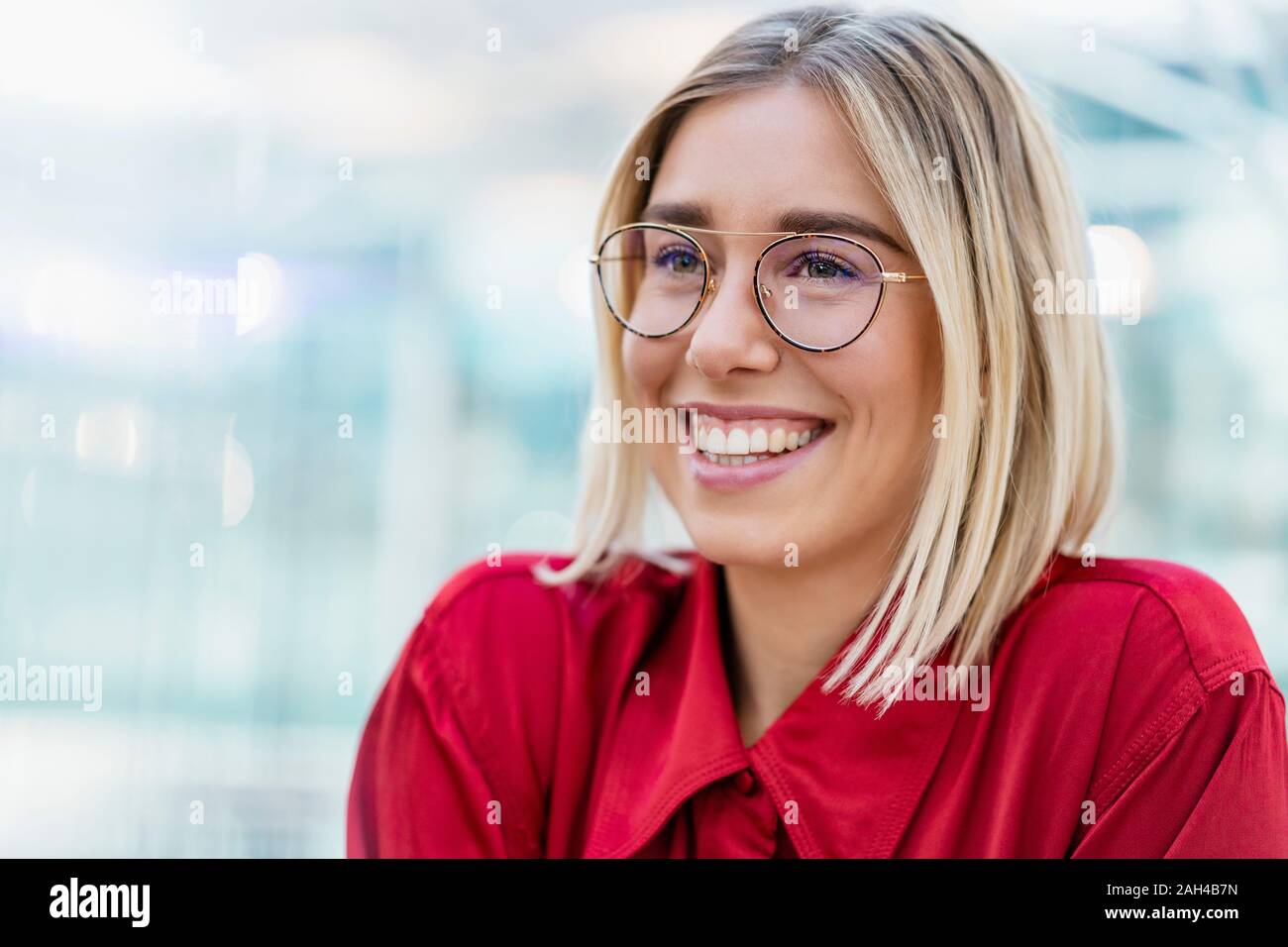 Portrait of a smiling young businesswoman Stock Photo