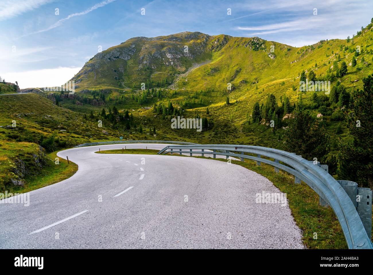 Austria, Carinthia, Scenic view of Nockalm Road winding in green Nock Mountains Stock Photo