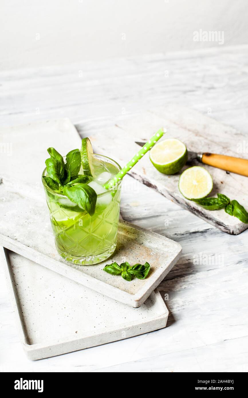 Gin basil smash with lime Stock Photo Alamy