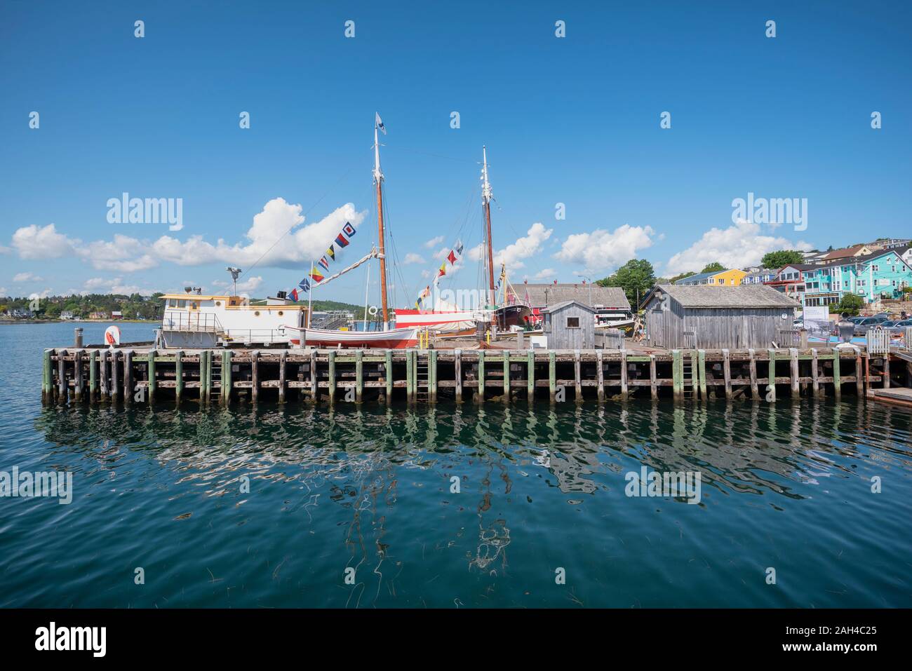 Canada, Nova Scotia, Lunenburg, Boats moored in old historical harbor Stock Photo