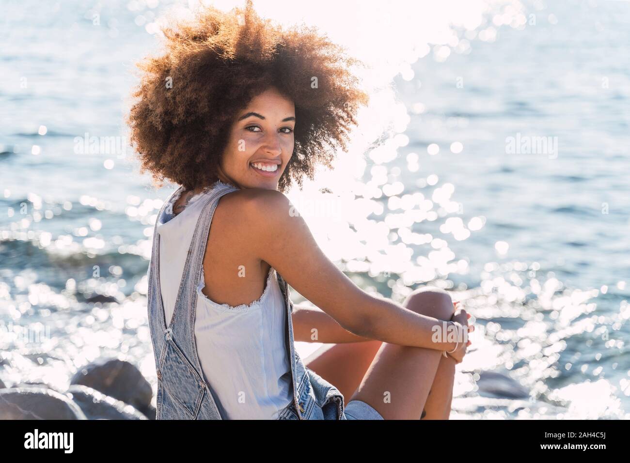 African descent woman turning hi-res stock photography and images - Alamy