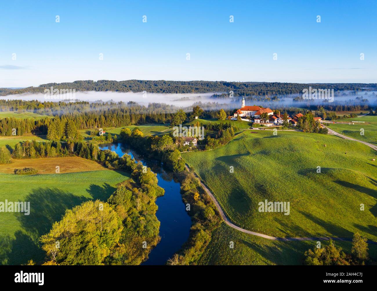 Germany, Bavaria, Upper Bavaria, Toelzer Land, Sachsenkam, Aerial view of landscape with Reutberg Monastery Stock Photo