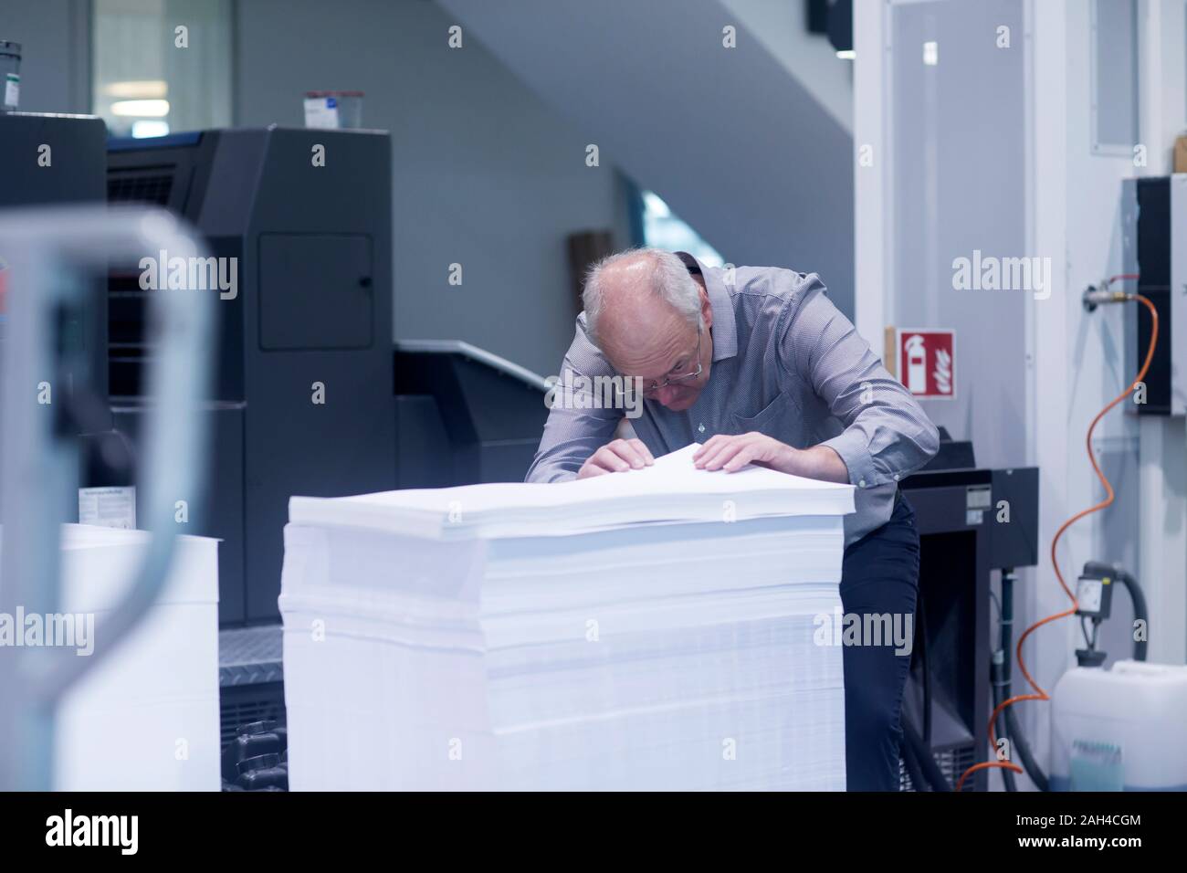 Manager working in printing house Stock Photo