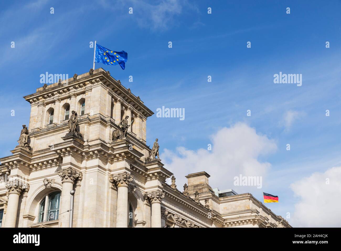 Germany, Berlin, European Union and German flags on top of Reichstag building Stock Photo
