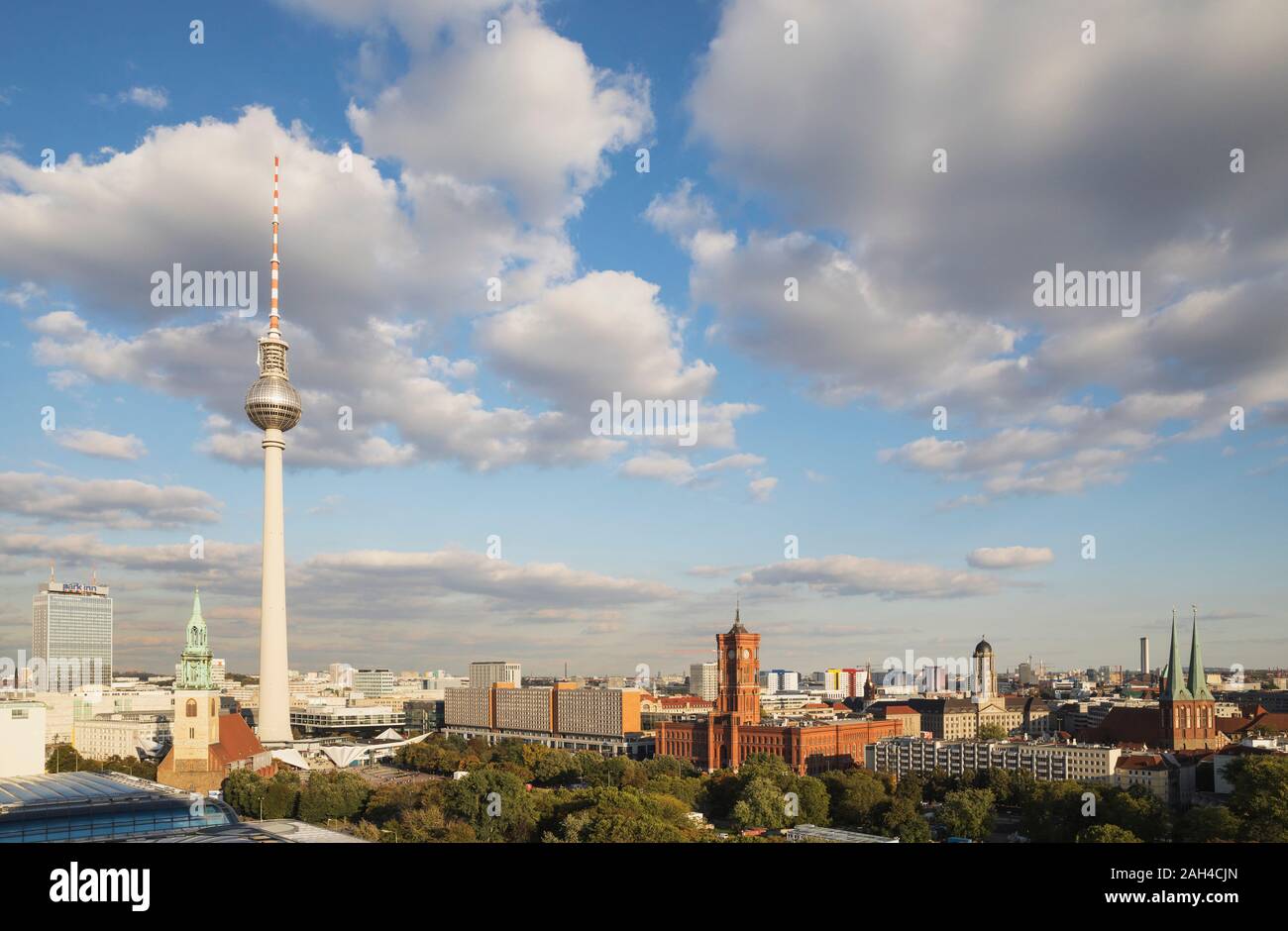 Germany, Berlin, Clouds over Berlin TV Tower and surrounding city buildings Stock Photo