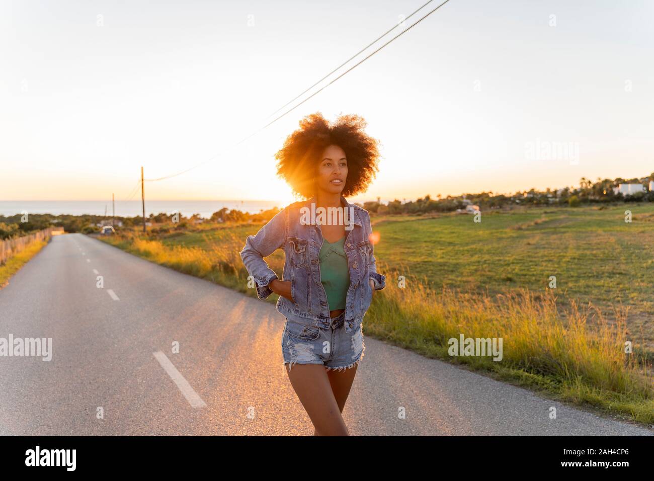 African woman walking hi-res stock photography and images - Alamy