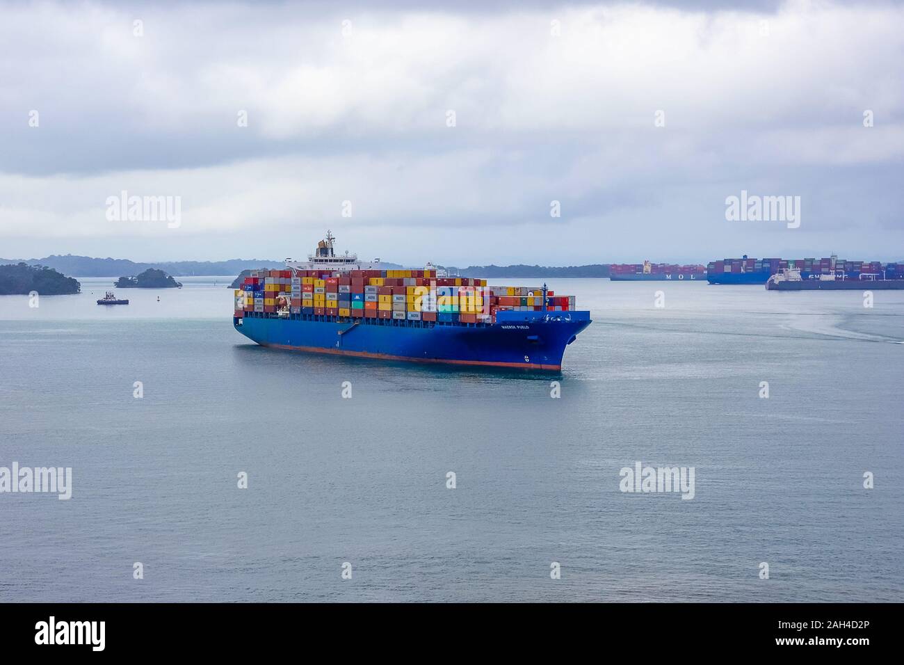Panama Canal, Panama - December 7, 2019: Maersk Line container cargo ship at Gatun Lake near Panama Canal. It is the world's largest container shippin Stock Photo