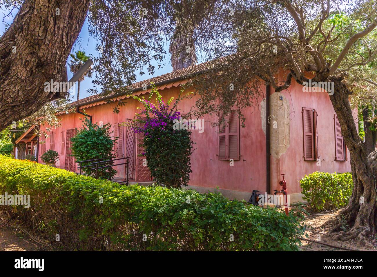 Zichron yaakov, Israel - November 11, 2019: Pink gabled house. Stock Photo