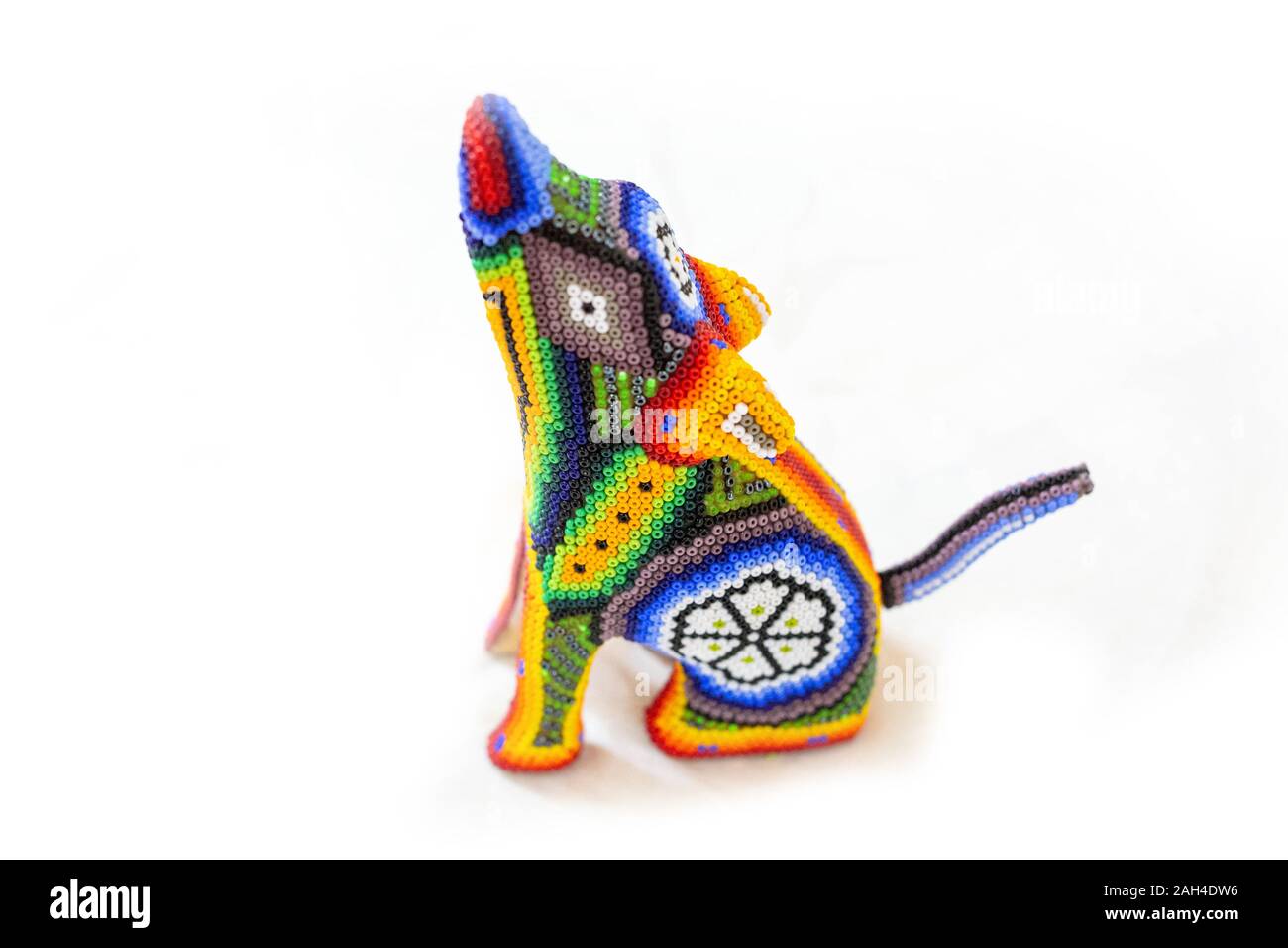 Traditional huichol bead ornament figures mexican culture work Stock Photo