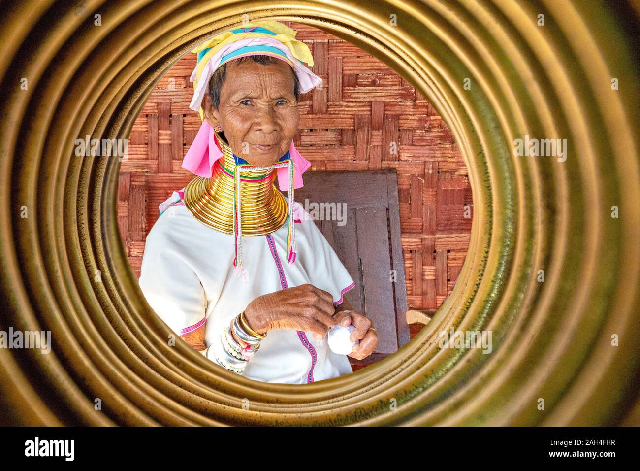 Elderly tribal long neck woman through neck rings, in Inle Lake, Myanmar Stock Photo