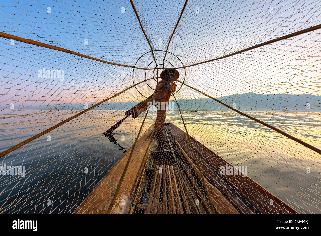 Fishermen in Inle Lake known also as leg rowers, Myanmar Stock Photo
