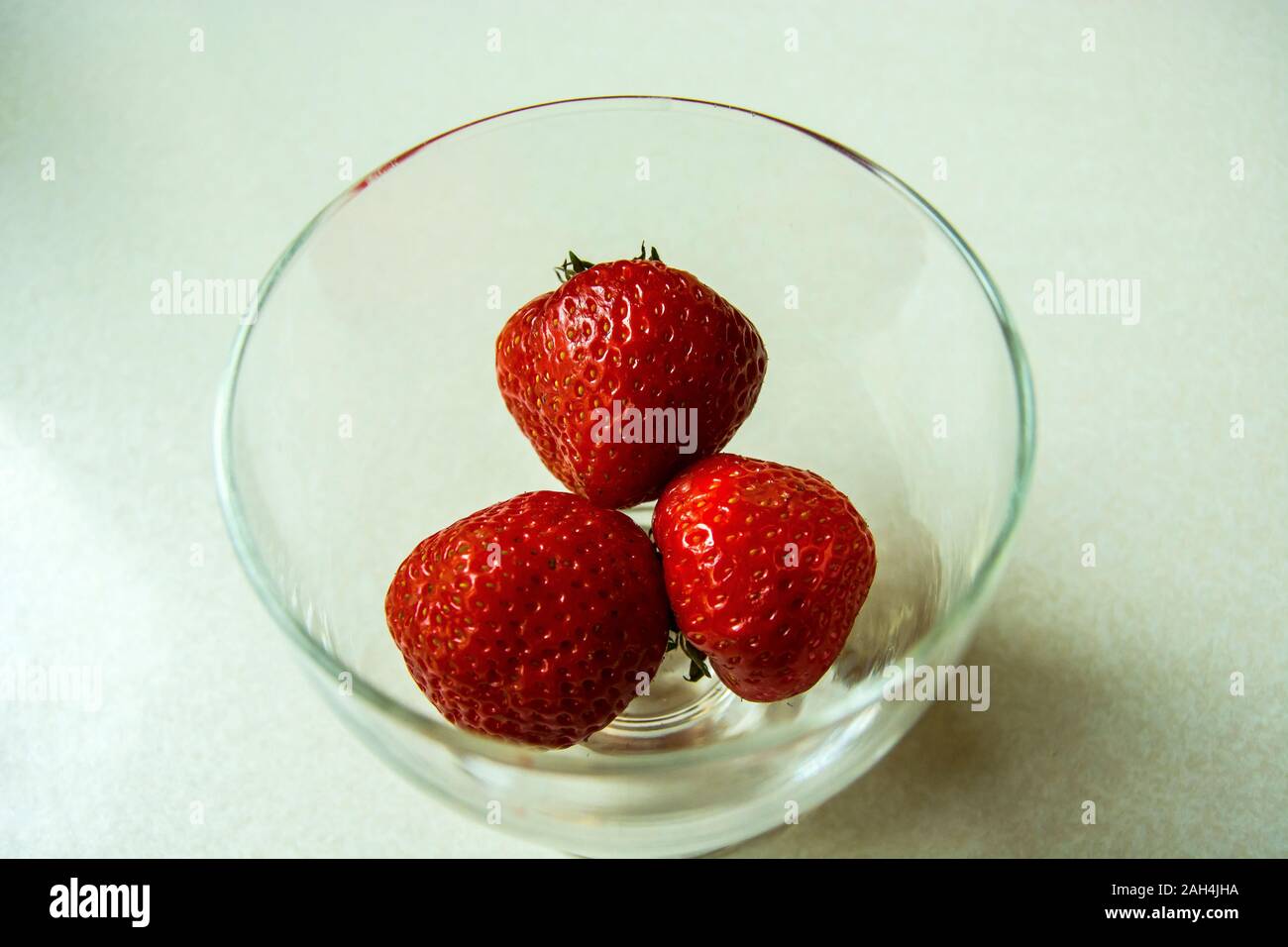 Closeup strawberries in bowl hi-res stock photography and images - Alamy