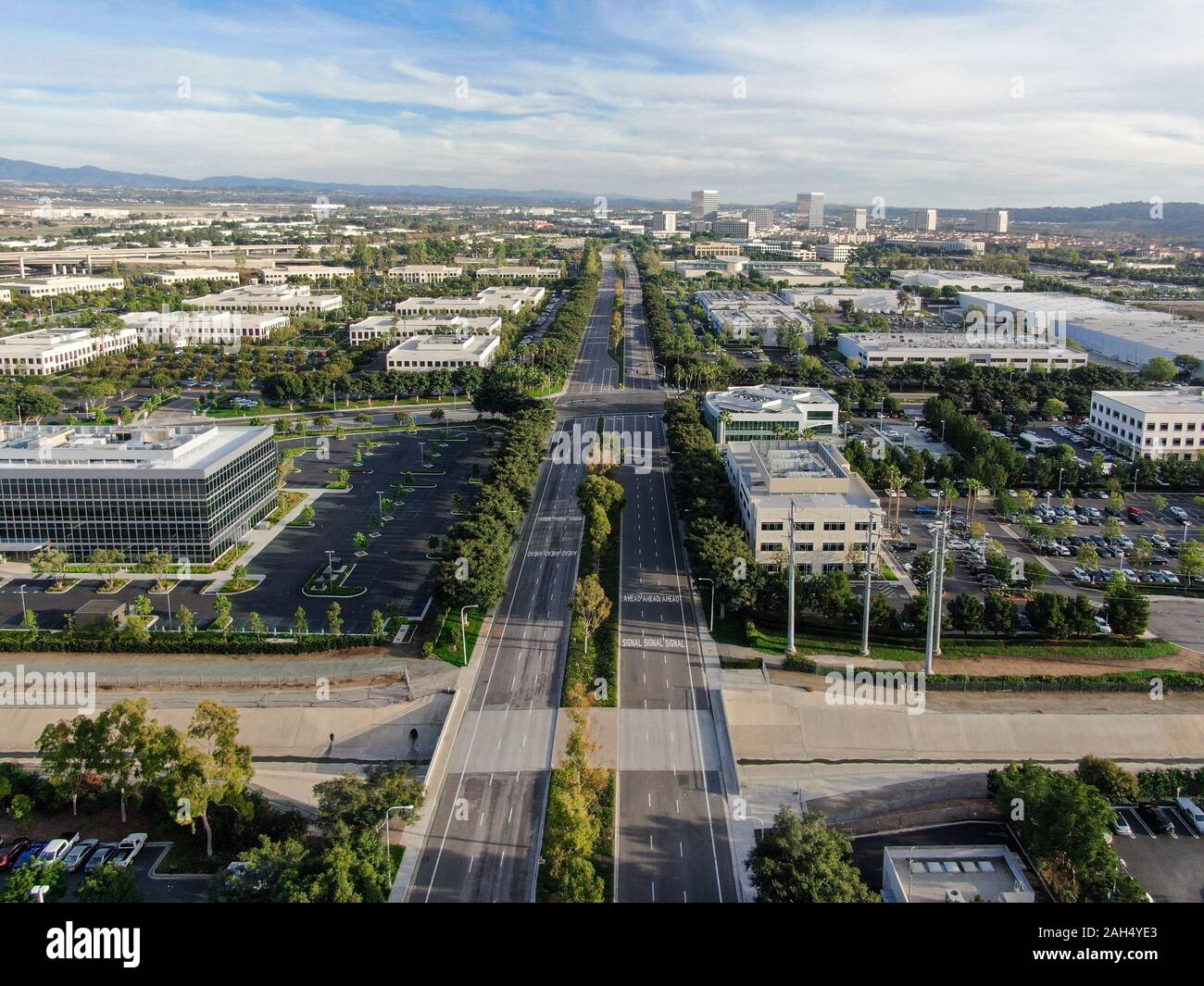 Aerial view of business and finance district with new office building surrounded by parking and road. Irvine Business Complex. Irvine California. USA Stock Photo