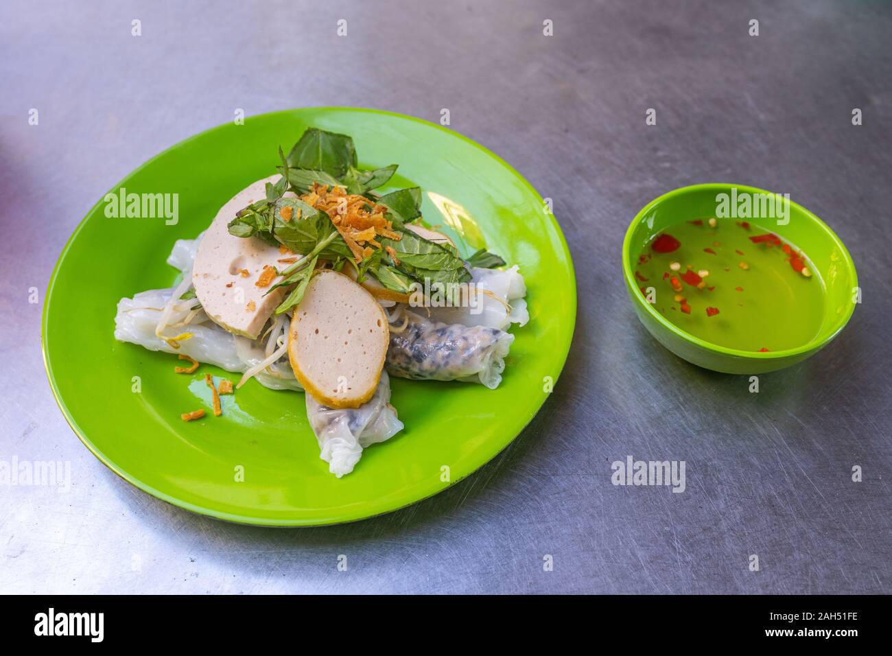 Popular Vietnamese street food- steamed rice rolls, Banh Cuon Stock ...