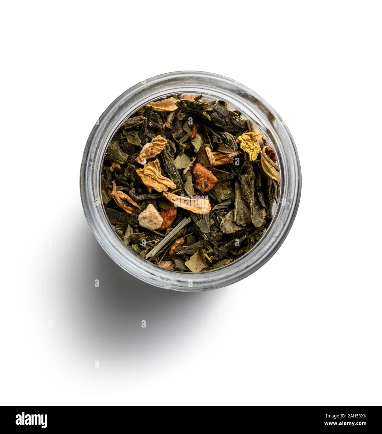 Green tea with aromatic additives. Top view on white background Stock ...