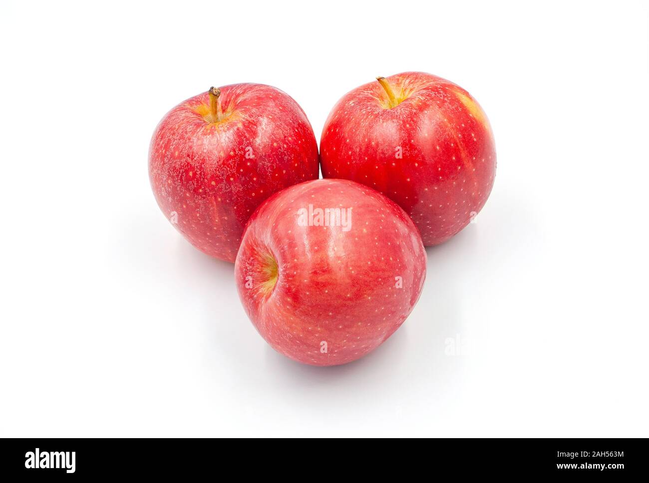 Fresh red apples isolated on white background Stock Photo - Alamy