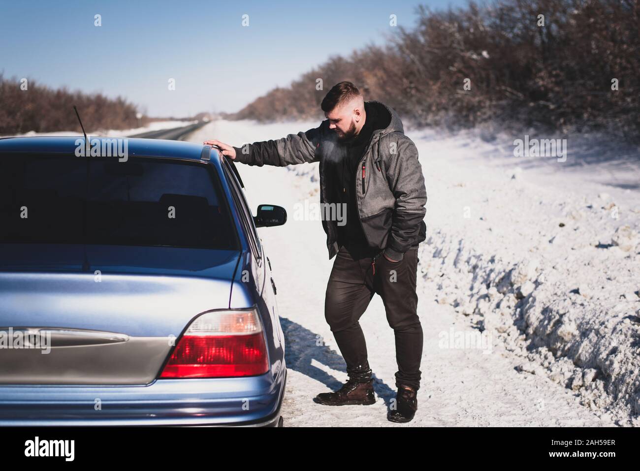 Man stands near damaged hi-res stock photography and images - Alamy