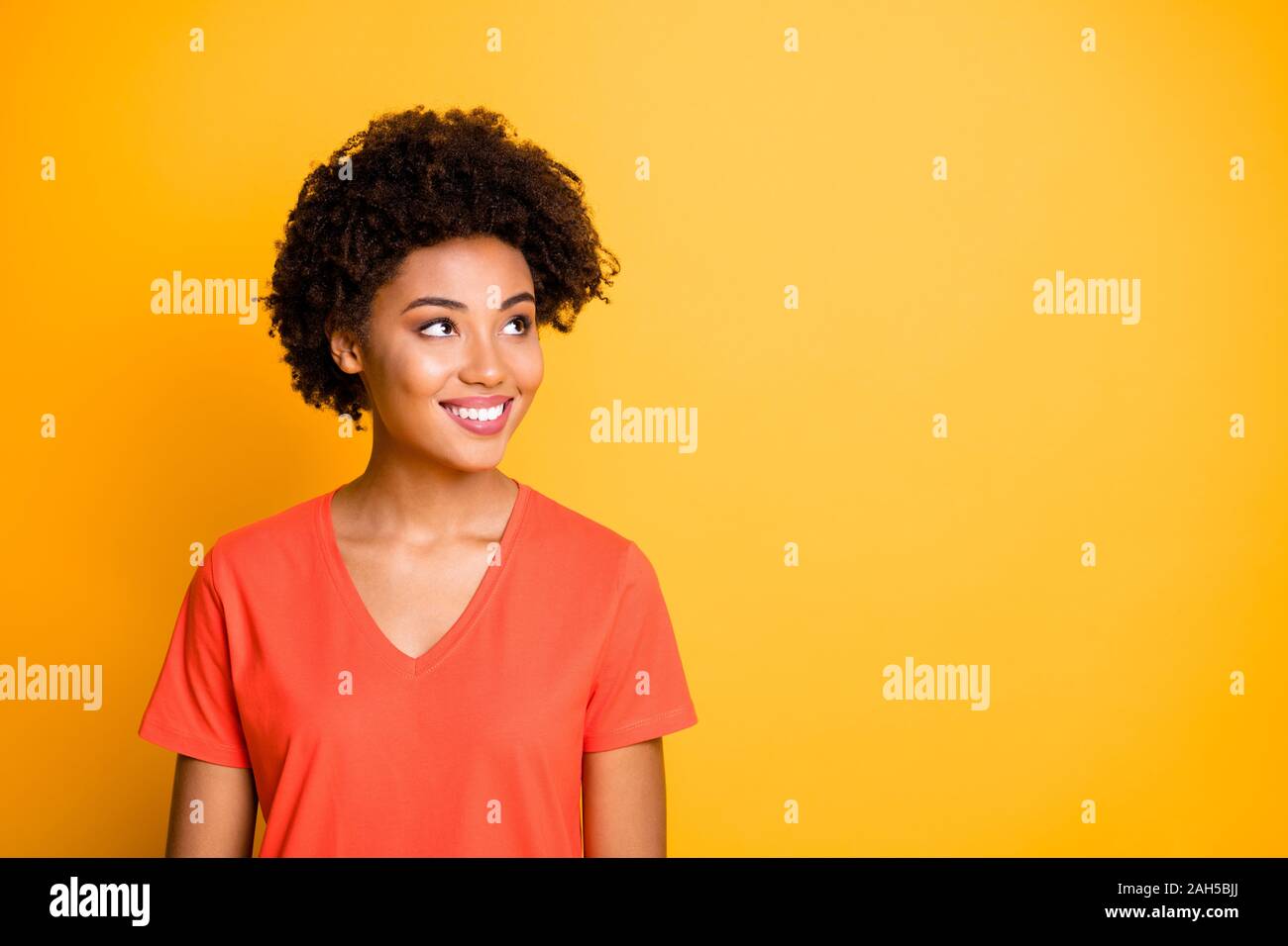 Photo Of Pretty Dark Skin Lady Looking Empty Space With Interest