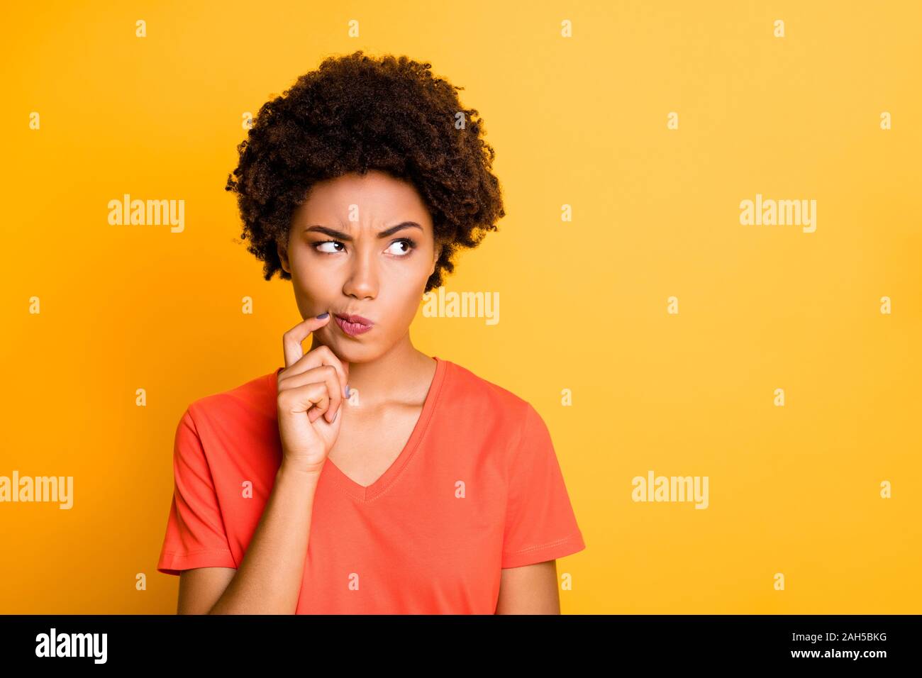 Photo Of Funny Dark Skin Lady Doubtful About Making Important