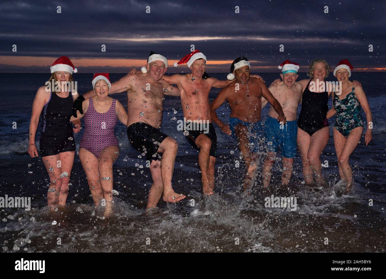 Members of the King Edward's Bay swimmers enjoy a Christmas Day dip at sunrise, at King Edward's Bay, Newcastle. Picture date: Wednesday December 25, 2019. Photo credit should read: Owen Humphreys/PA Wire Stock Photo