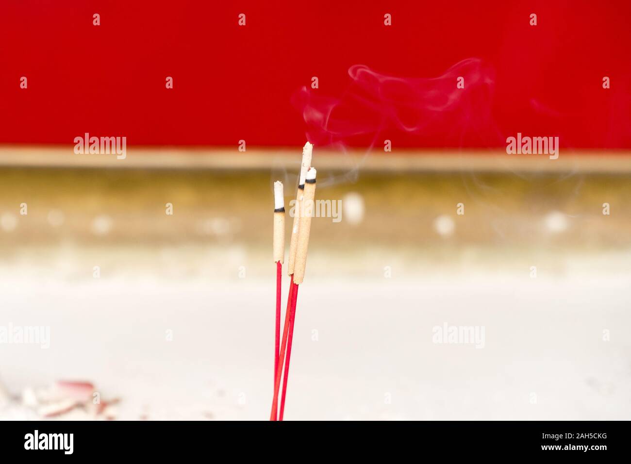 Burning praying incense at Buddhism temple Stock Photo Alamy