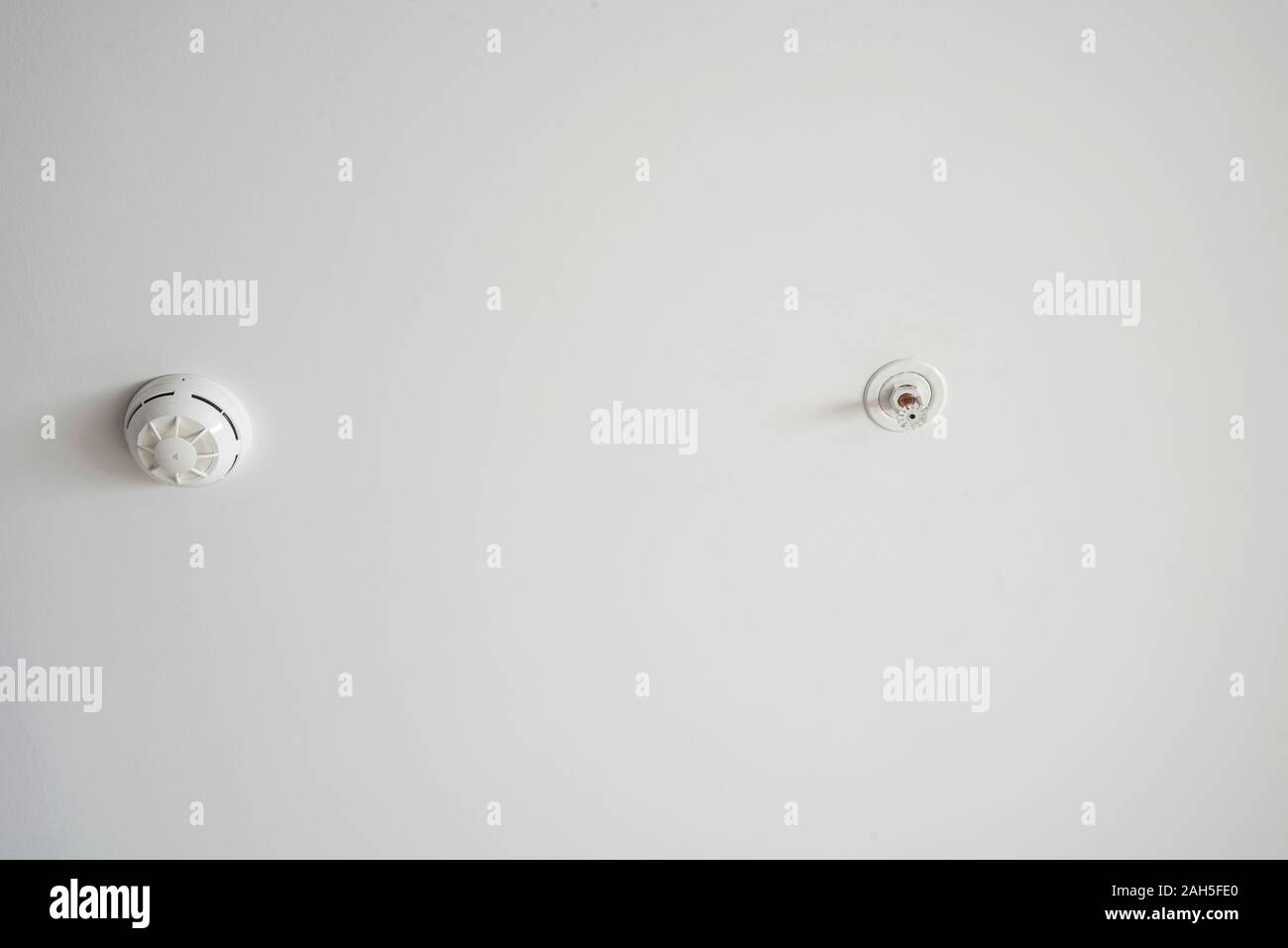 Fire alarm and sprinkler on the white ceiling Stock Photo - Alamy