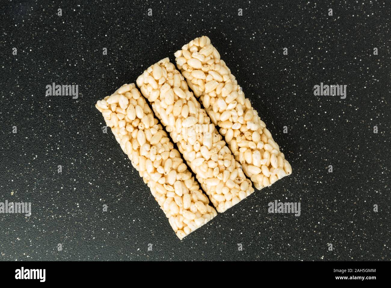 Several puffed plain round rolled rice snacks Stock Photo - Alamy
