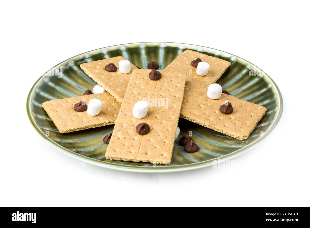 Stack of smore ingredients marshmallow graham cracker and chocolate